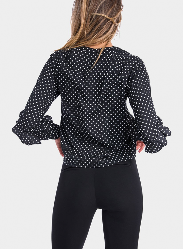 Costas de blusa às bolinhas com folhos em preto da Tiffosi