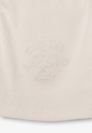 Top bege c/ tenisball para girl da Tiffosi